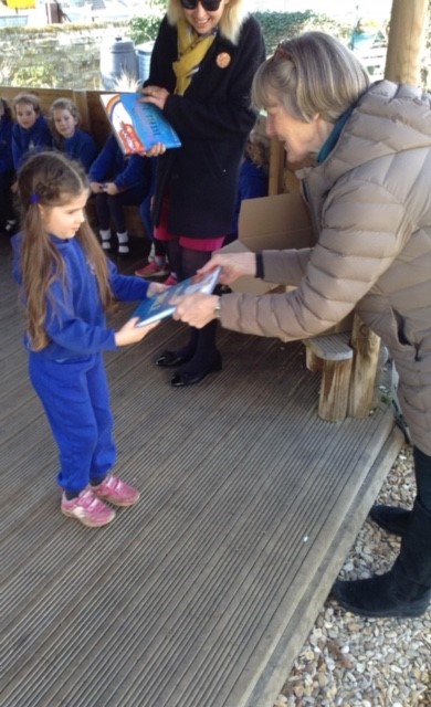 Cecily receives her Bible from Les