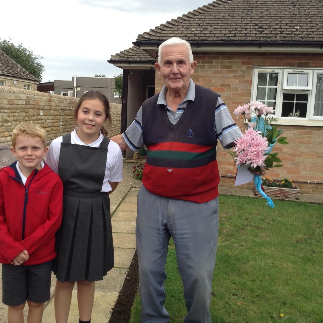 Mr Edwards receives his card and flowers